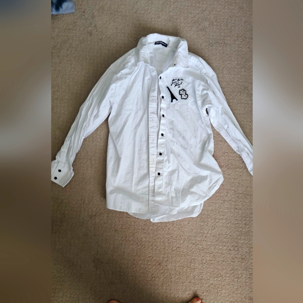 White Button-Up Shirt with Black Accents